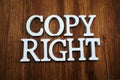 Copy right alphabet letters top view on wooden background Royalty Free Stock Photo