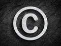 Copy right c symbol stone wall background