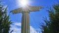 The copy of the sculpture of Christ the Savior spread his arms on blue sky background Royalty Free Stock Photo