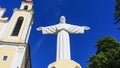 The copy of the sculpture of Christ the Savior spread his arms on blue sky background Royalty Free Stock Photo