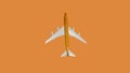 Copy space Airplane in flight on orange background, model passenger plane copy space