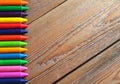 Copy space background with oil pastel crayons on a wooden table Royalty Free Stock Photo