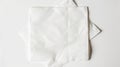 With copy space, a blank paper napkin is isolated on a white background Royalty Free Stock Photo