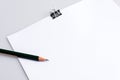 Copy space blank paper A4 and pencil and back binder clip on tab Royalty Free Stock Photo