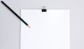 Copy space blank paper A4 and pencil and back binder clip on tab Royalty Free Stock Photo