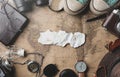 Copy Space of Burnt Paper Travel Concept Background. Overhead View of Traveler`s Accessories on Old Vintage Map Royalty Free Stock Photo