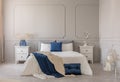 Copy space on grey wall of scandinavian bedroom interior with blue, white and grey design Royalty Free Stock Photo