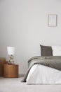 Copy space on empty white wall of elegant bedroom interior with comfortable king size bed Royalty Free Stock Photo