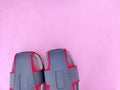 Copy space of one pair of grey and red color men sandals