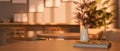 Copy space on table over blurred background of beautiful and minimal coffee shop seating space Royalty Free Stock Photo