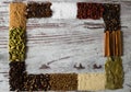 Copy space of spices frame. Black pepper, cardamom, coriander, mustard seeds, bay leaf, cinnamon. Royalty Free Stock Photo