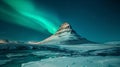 copy space, stockphoto, wonderful night view of icelandic kirkjufell mountain during winter with amazing northern lights above