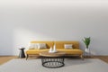 Copy space and yellow couch in living room interior with coffee table and plant