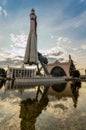 A copy of the Vostok space launch vehicle and the space pavilion against the evening sky. Exhibition of achievements of the