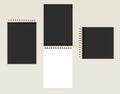 Vector realistic black notebooks. Mockup set. Different shapes. Open and closed notepad, organizer, diary on a beige background. B