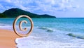 Copyright concept, author rights and patented intellectual property, Copyright Symbol Protection Sign on clean sandy beach Royalty Free Stock Photo