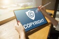 Copyright icon on screen. Patent Law and Intellectual Property. Business, Internet and Technology Concept. Royalty Free Stock Photo