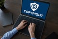 Copyright icon on screen. Patent Law and Intellectual Property. Business, Internet and Technology Concept. Royalty Free Stock Photo