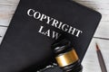 Copyright Law book with gavel background. Law concept Royalty Free Stock Photo