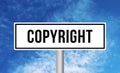 Copyright road sign on blue sky background Royalty Free Stock Photo