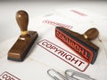 Copyright stamp standing on documents. 3D illustration Royalty Free Stock Photo