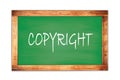 COPYRIGHT text written on green school board