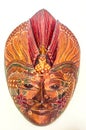 Copyrighted free image or picture of batik painted wooden mask in reddish brown