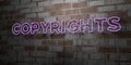 COPYRIGHTS - Glowing Neon Sign on stonework wall - 3D rendered royalty free stock illustration