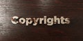 Copyrights - grungy wooden headline on Maple - 3D rendered royalty free stock image