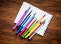 Copyspace blank sheet of white paper covered with multiple colorful felt pen markers Royalty Free Stock Photo