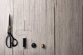 Copyspace frame with sewing tools on wooden table Royalty Free Stock Photo