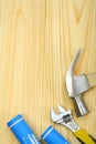 Copyspace image of hammer spanner and blueprints Royalty Free Stock Photo