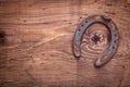 Copyspace image the old rusty horseshoe on vintage Royalty Free Stock Photo