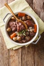 Coq au vin - french food slowly cooked with wine and vegeta
