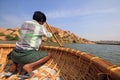 A coracle boatman in Hampi lake Royalty Free Stock Photo