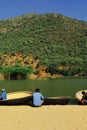 coracle boats and boatmen at the bank of kaveri river at hogenakkal