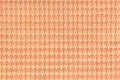 Coral background from soft fleecy fabric close up. Texture of textiles macro. Royalty Free Stock Photo