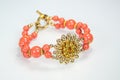 Coral Bracelet with Filigre Flower Royalty Free Stock Photo
