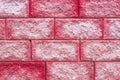 Coral Brick wall texture close up. Pink, red, texture. Modern brick wall wallpaper design for web or graphic art projects.