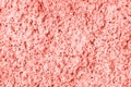 Coral decorative plaster grainy texture on wall Royalty Free Stock Photo