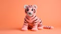 Coral Knitted Tiger Toy On Pink Background - Realistic Doll Knitting Pattern