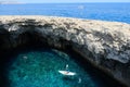 Coral lagoon with an inland sea with an arch of a collapsed cave in Mellieha, Malta