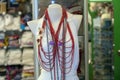 Coral necklage on mannequin at the market