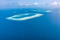 Maldives aerial panorama blue water reef and coral islands Royalty Free Stock Photo