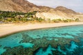 Coral reef of Red Sea, beach and desert near Eilat, Israel Royalty Free Stock Photo