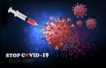 Coranavirus concept background. Syringe with vaccine destroying virus COVID - 19