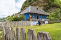 Corbi, Romania - July 2019: traditional authentic peasants house painted in blue in an old village at the foothills of the