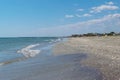 Corbu, Constanta, Romania - August 18, 2019: The beach in Corbu with tourists in the background, Romania