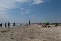 Corbu, Constanta, Romania - August 14, 2019: People enjoy a relaxing summer day on the last virging beach in Corbu, Romania