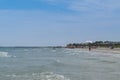 Corbu, Constanta, Romania - August 17, 2019: People enjoy a relaxing summer day on the last virging beach in Corbu, Romania